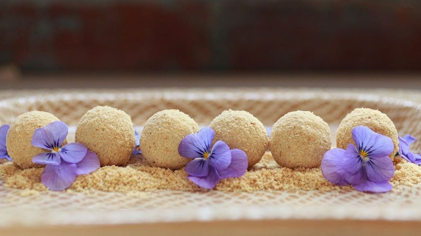 Goat cheese balls with flowers.